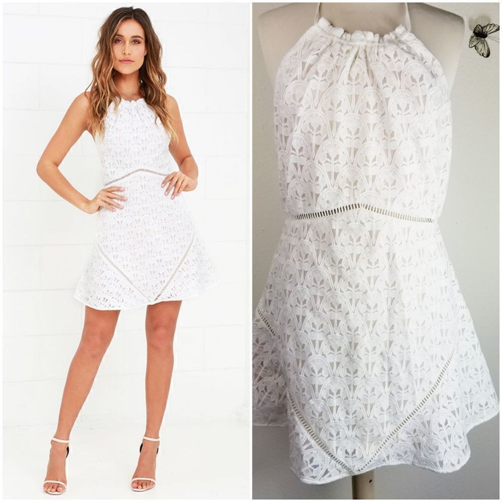 Joa approaching Avalon lace dress. New